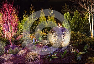 Water Fountain in Night Landscape Scene