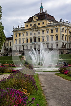 Water fountain in park of baroque castle