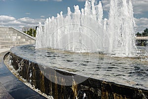 Water fountain water jet over blue sky/Head of water jets from fountain over blue sky