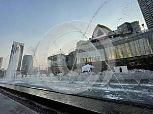 Water fountains outside luxury mall photo