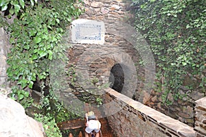 Water from the Fuente Agria de PÃ³rtugos, in Granada, Spain. Forming a small stream