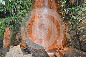 Water from the Fuente Agria de PÃ³rtugos, in Granada, Spain. Forming a small stream