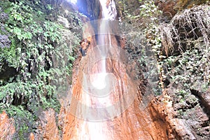 Water from the Fuente Agria de PÃ³rtugos, in Granada, Spain. Forming a small stream