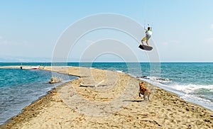 Water fun and kiteboarding on Ada Bojana, Montenegro, with a dog