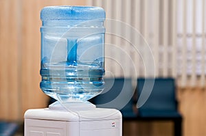 Water gallon on water cooler photo