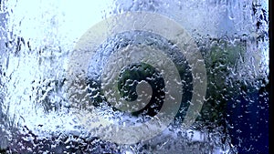 Water on the glass. Rainy. The texture of the water. Raindrops on the window.