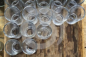 Water glasses in a wooden crate.