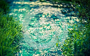 Water and grass bokeh