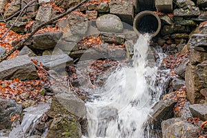 Water Gushing From A Storm Pipe