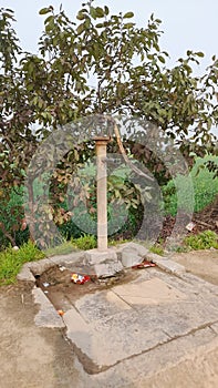 A water hand pump on the roadsides shah jamal photo