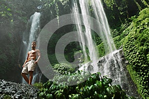 Water. Healthy Man With Body Near Waterfall. Healthcare