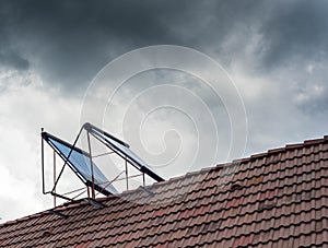 Water heater glass pipes on residentual house roof top