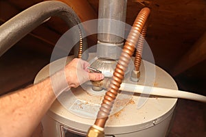 Water Heater - hand releases T&P Relief Valve photo