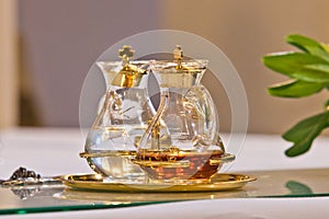 Water and wine on the altar ready for mass