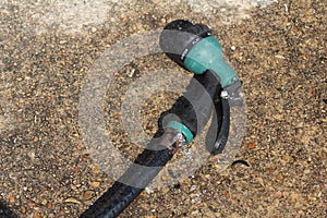 Water hose that is leaking from nozzle.