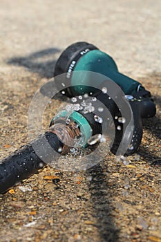 Water hose that is leaking from nozzle.