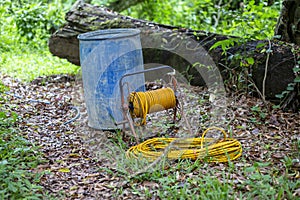 The water hose is strong and tidy. Water hose used in agricultural gardens, the side has a plastic water tank, two hundred liters