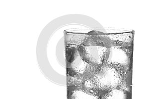 Water with ice cubes in glass isolate on white background