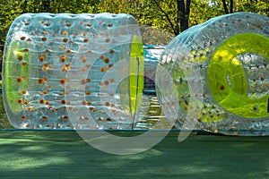 Water inflatable ride during the absence of people in the park. summer outdoors entertainment, entertainment and business concept