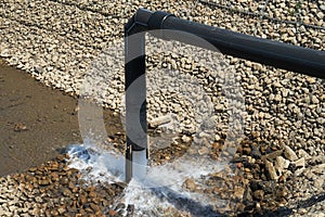 Water intake pipes in a dried reservoir.