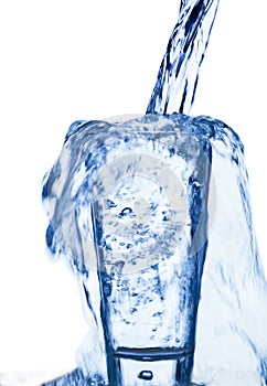 Water is introduced into a glass of water