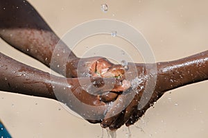 Water Issues in Africa - Black Children Washing Hands