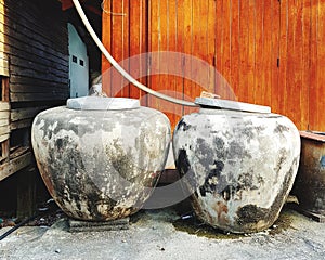 Water jars at rural house photo