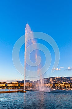 Water jet fountain at sunset in Geneva