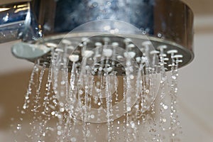 Water jet from a shower head in the bathroom