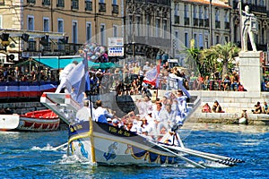 Water Jousting performance during St.Louis festival at the streets of Sete, South of France