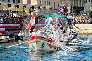 Water Jousting performance during St.Louis festival at the streets of Sete, South of France