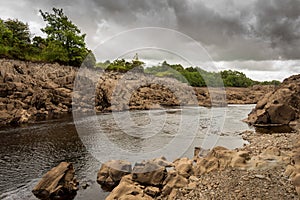 Water of Ken river flowing through a rocky gorge near Dalry, Galloway, Scotland