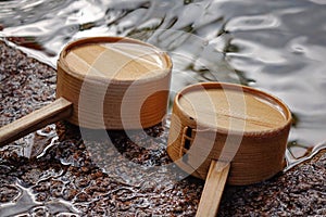 Water ladles at Itsukushima Shrine in Hiroshima, Japan