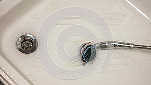 water leaking in the bathroom from the sink faucet and shower with drops that keep coming down