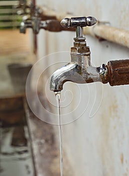 Water leaking through a tap.