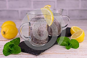 Water with lemon and chia seeds. Useful drink for weight loss and health.