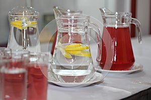 Water with lemon and juice lemonade. This drink combines the delicious flavors of cranberry and together with water.