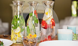 Water with lemon strawberries and mint