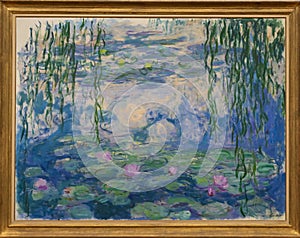 Water lilies, Nympheas, with weeping willow, by French impressionist painter Claude Monet