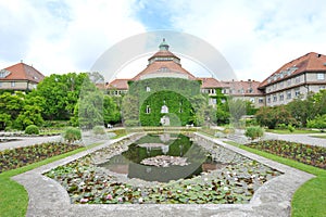 Water lily pond in front of Botanical Institute building in Munich Botanical Garden