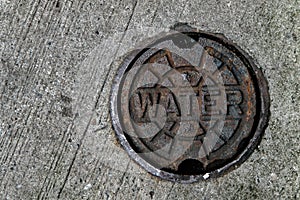 Water main manhole cover