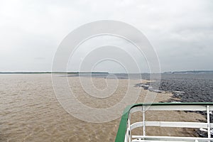 Water meeting in brazil -amazon river with rio del negro