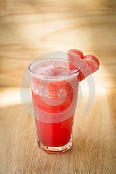 Water melon Fruit shake with a heart shaped piece of watermelon