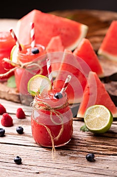 Water melon smothie on wooden table