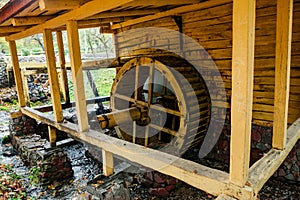 Water Mill in the autumn forest