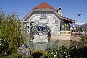 Water Mill on a wall of the building in Adler