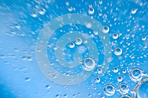 Water. Movement of air bubbles blue beautiful abstract underwater background