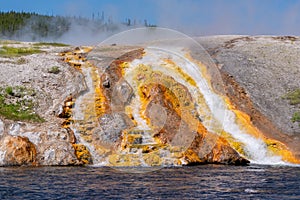 Water from the nearby hot spring flows into the river.