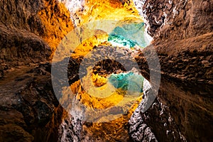 Water optical illusion reflection in Cueva de los Verdes, an amazing lava tube and tourist attraction on Lanzarote island, Spain