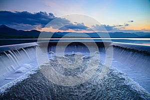 Water overflow into a spillway